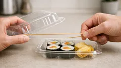 The rubber band hack that turns a plastic clamshell into two sturdy plates