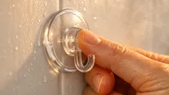 Make suction cup hooks stick for good with a tiny dab of hand cream