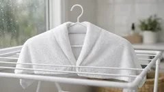The simple hanger fold that helps bath towels dry faster indoors